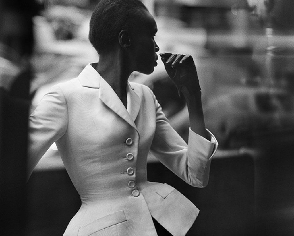 fashion photographers: Peter Lindbergh, Alek Wek wearing a Dior “Bar jacket”, New York, 2018. Pinterest.