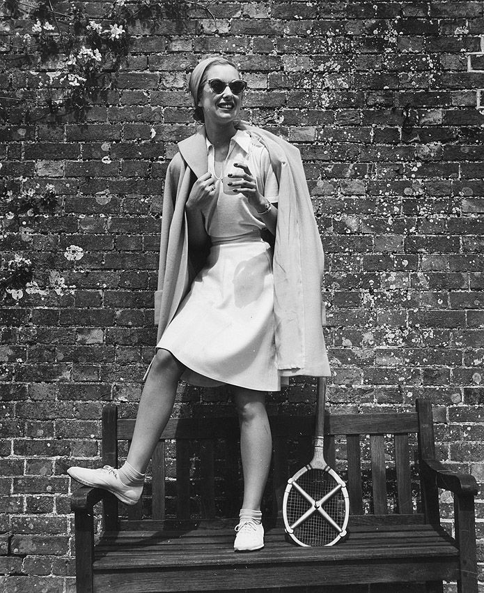 fashion photographers: Lee Miller, A model wearing a tennis outfit, 1950. Getty Images.
