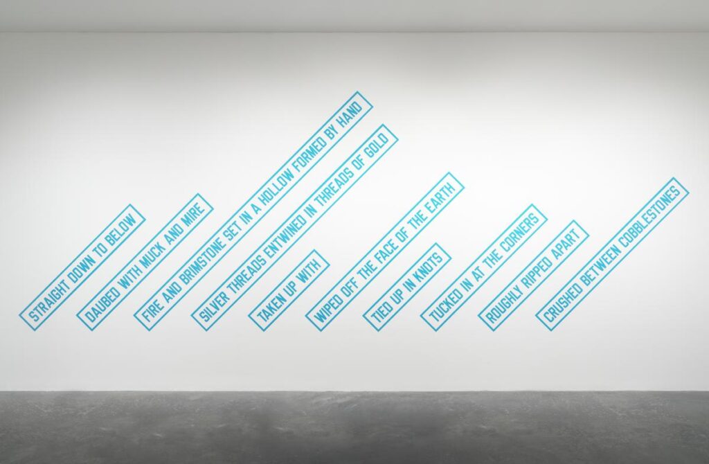 conceptual art: Lawrence Weiner, CRUSHED BETWEEN COBBLESTONES, 1988, Tate, London, UK. © Lawrence Weiner.
