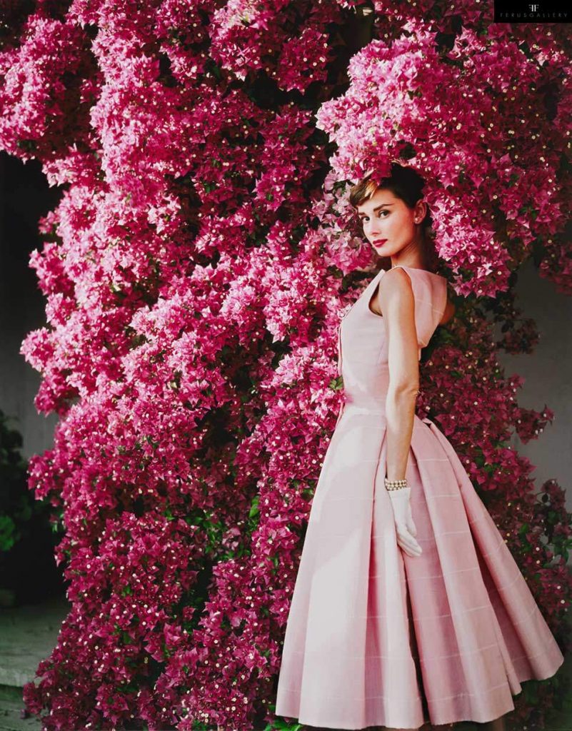 fashion photographers: Norman Parkinson, Audrey Hepburn wearing a Givenchy afternoon cocktail dress, Italy, 1955. Ferus Gallery.