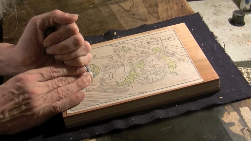 Japanese woodblock prints Caption from Ukiyoe Heroes (2) : cutting a colour block, Posted by David Bull, via YouTube, 27 Jun 2012.